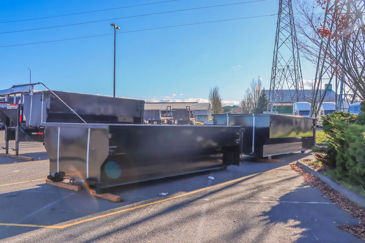 Roll-off dumpster ready for waste disposal at job site for Demolition Dumpster Rental in Yankee Springs